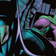 Batman ponders the Batcomputer, Fingers perched in front of his face, as Tim Drake's Robin watches.